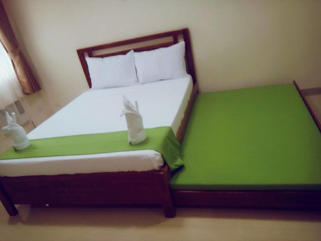 Gilin Pension House Puerto Princesa Bagian luar foto